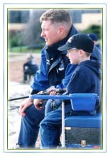 Child learing to fish